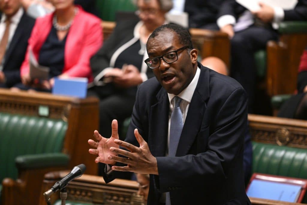 Kwasi Kwarteng talking of the tax cuts and reforms to the Parliament