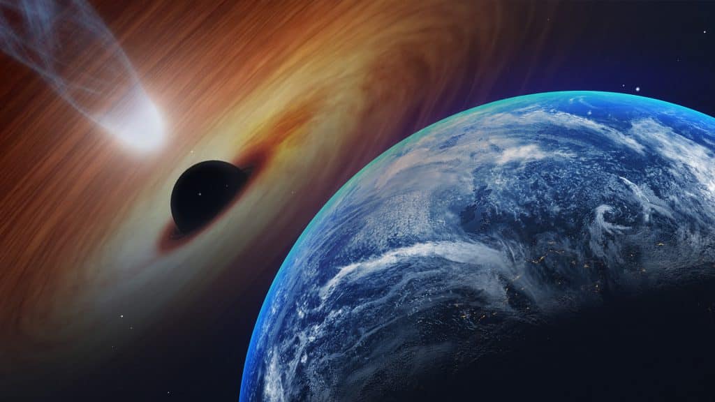 Black hole points directly at Earth and emits light toward us
