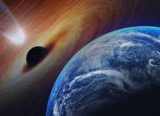 Black hole points directly at Earth and emits light toward us