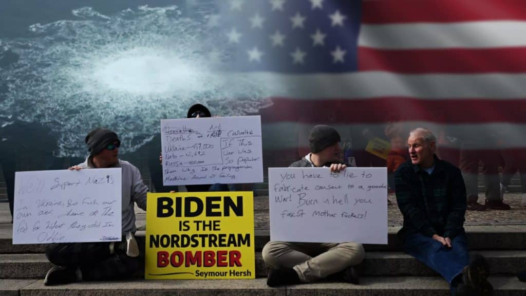 Durante las protestas en Estados Unidos, los manifestantes levantan pancartas culpando a Joe Biden de estallar los gasoductos, Nord Stream.