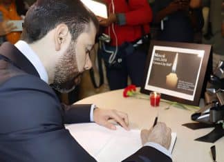 Representatives of Nicaragua sign a book of condolences for the victims of the attack in Russia