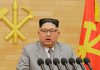 Pyongyang advierte respuesta contundente ante escalada militar de Estados Unidos Kim Jong-un pronuncia un discurso de Año Nuevo frente a micrófonos y banderas de Corea del Norte.