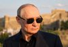 Putin: Kiev abrió una caja de Pandora al atacar civiles en Rusia Presidente de Rusia durante una visita en el exterior, con una fortificación histórica al fondo.