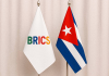 Cuba evalúa convertirse en miembro pleno de los BRICS Las banderas de Cuba y los BRICS, símbolo del acercamiento de la nación caribeña al bloque de economías emergentes