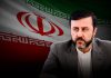Irán: EE.UU. no podrá eludir sus responsabilidades al salirse del Consejo de Derechos Humanos El vicecanciller iraní Kazem Qaribabadi con bandera de Irán al fondo.