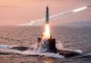 China prueba con éxito misiles con submarinos nucleares de última generación Submarino nuclear chino lanza un misil balístico desde el océano durante una prueba militar.